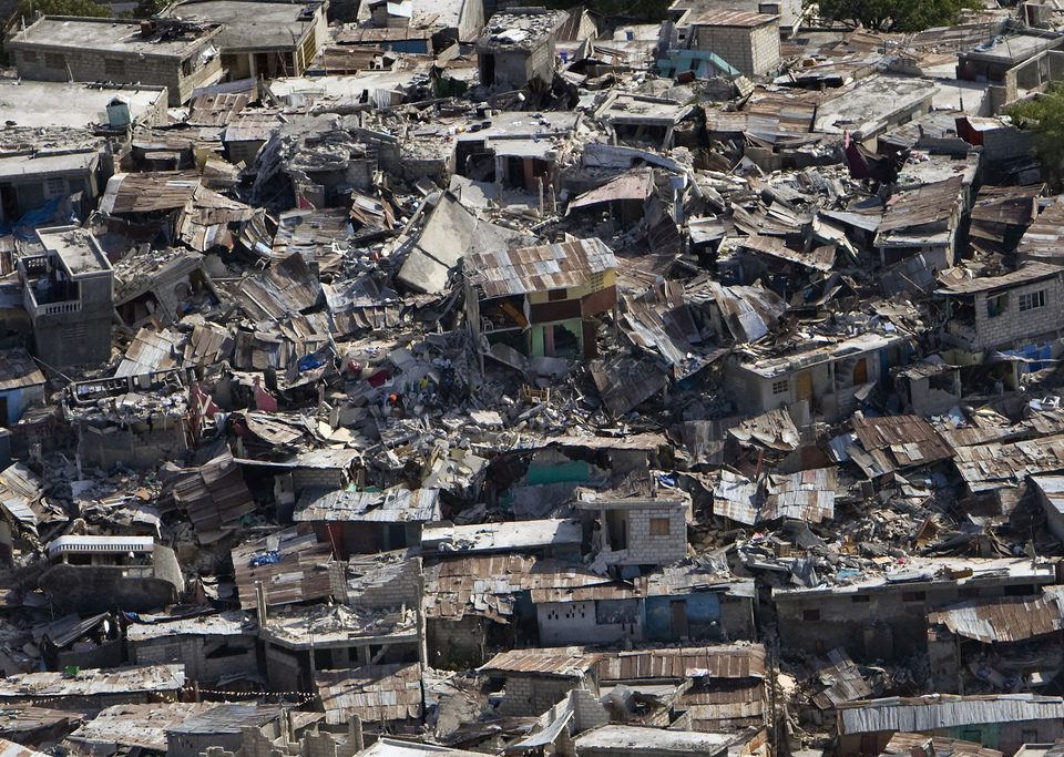 A poor neighbourhood shows the damage after an earthquake measuring 7 plus on the Richter scale rocked Port au Prince Haiti just before 5 pm, January 12, 2009.
